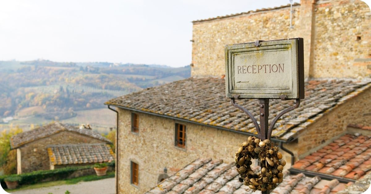 a wide shot of a bed and breakfast reception sign